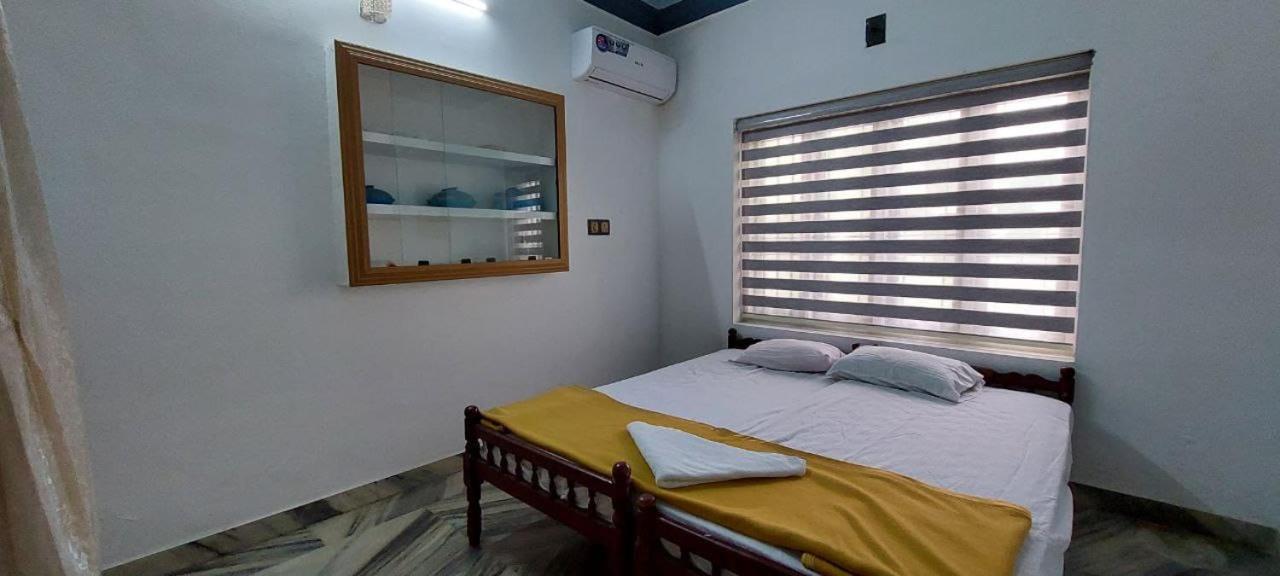 Jinan Palace Guest House Jinan Palace Guest House เนดุมบัสเซรี ภายนอก รูปภาพ