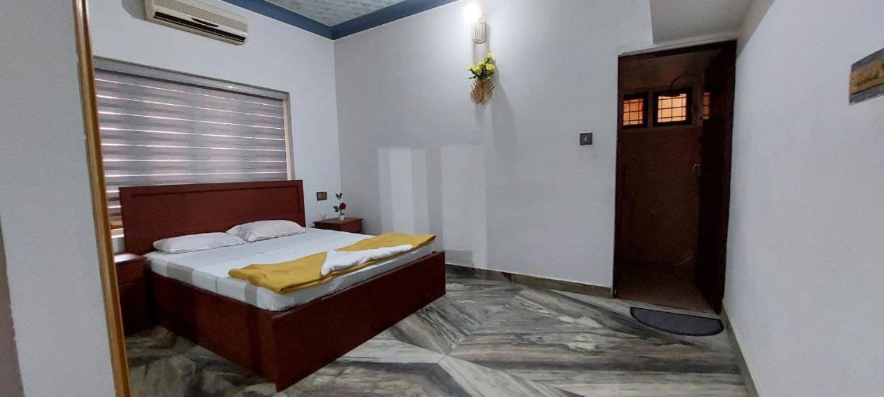 Jinan Palace Guest House Jinan Palace Guest House เนดุมบัสเซรี ภายนอก รูปภาพ